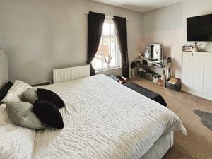 Bedroom One- click for photo gallery